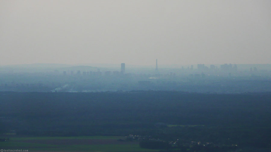 Eiffel and Montparnasse Tower seen from a very distant point of view
