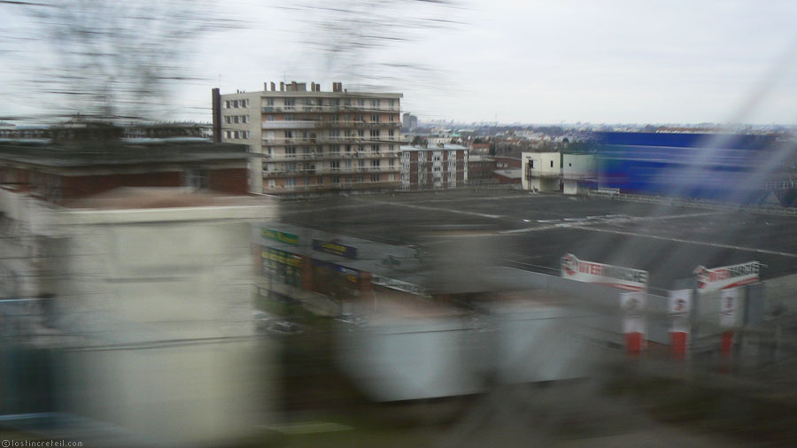View from the window of the RER E, east of Paris