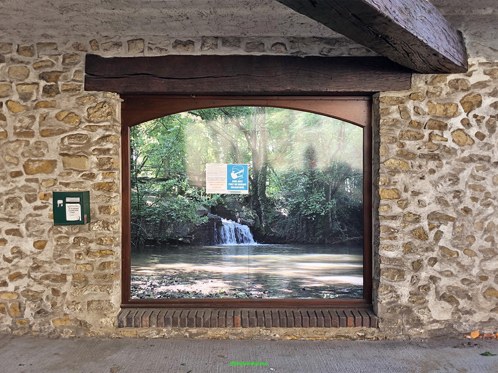 Waterfall on the Biocoop facade, La FertÃ©-Bernard, France