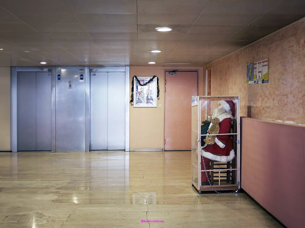 Christmas decorations in the lobby of a public housing building, Paris 13